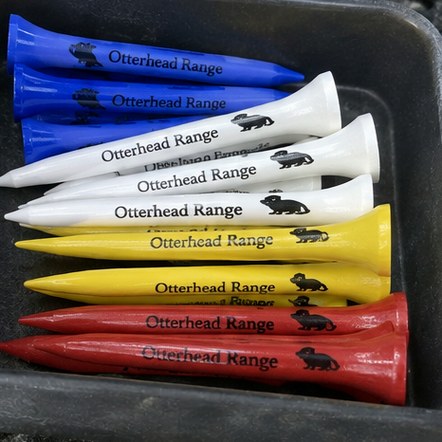 Customized golf tees for driving ranges and academies